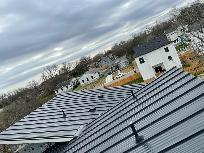 Standing seam metal roof panels with vents for Skylight Repair in Woodburn